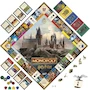 Miniatura de Monopoly Hasbro Gaming Harry Potter Edición Hogwarts - Juego de Mesa en Español para 2-6 Jugadores a Partir de 8 Años, Material Plástico, 6 Peones Dorados Temáticos, ASIN B0DB6MLYPH