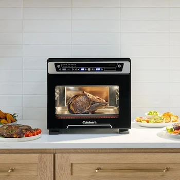 Imagen 3 de Cuisinart TOA-112ES Horno Tostador Air Fryer 14 en 1, Color Negro y Acero Inoxidable, Capacidad Interior 25 L, Dimensiones 47.2 cm Profundidad x 38.1 cm Ancho x 41.3 cm Alto, con Accesorios